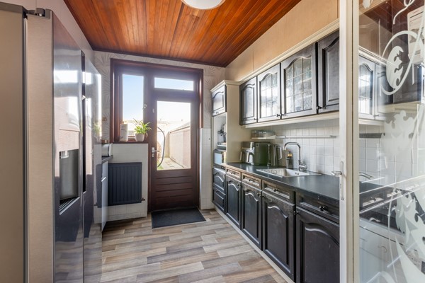 Foto - Te koop: Tussenwoning in Fijnaart